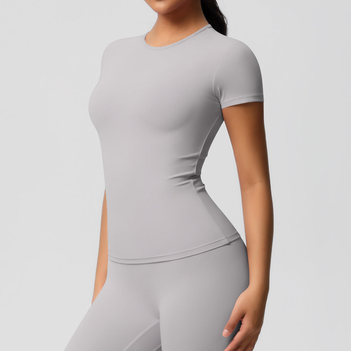 Cross-border European and American yoga pants solid color long-sleeved skin-friendly and breathable back sports short-sleeved slim and thin fitness pants set