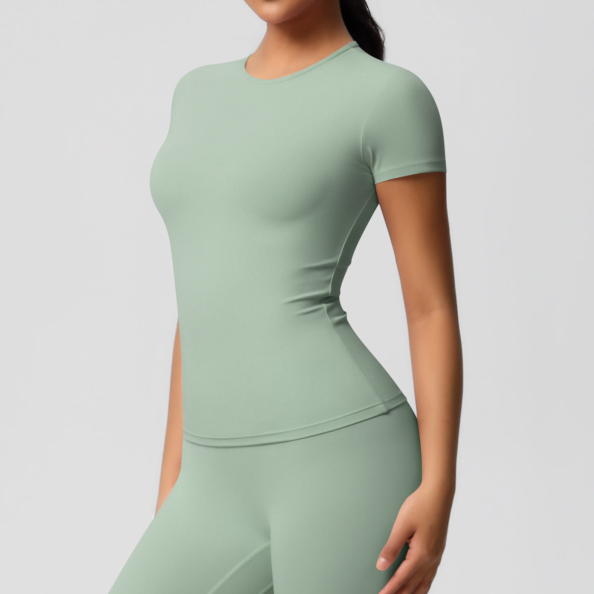 Cross-border European and American yoga pants solid color long-sleeved skin-friendly and breathable back sports short-sleeved slim and thin fitness pants set