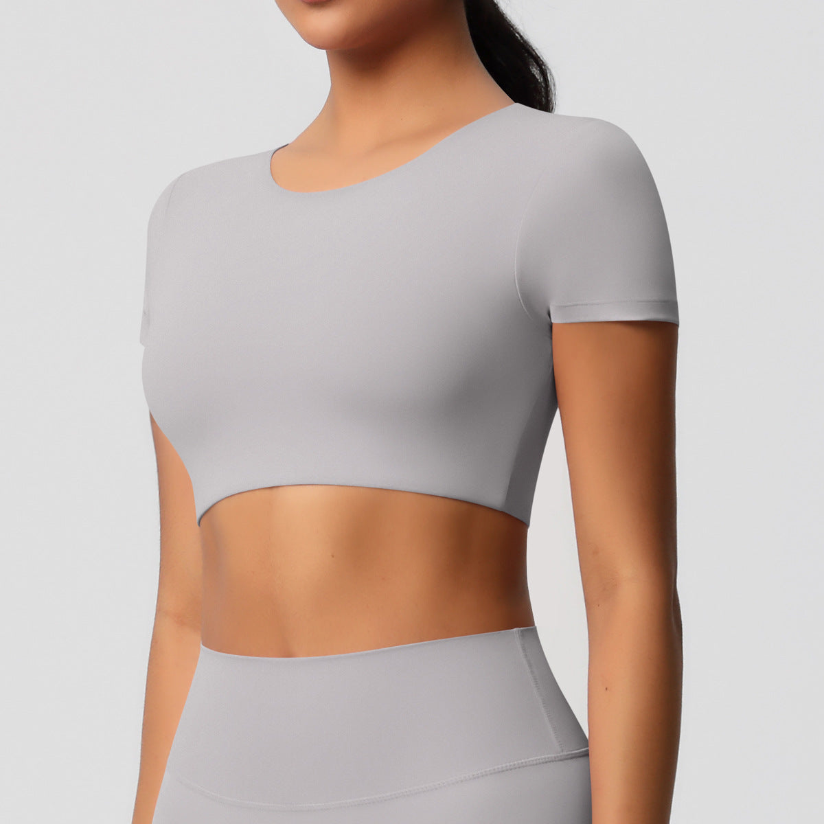 Cross-border European and American yoga pants solid color long-sleeved skin-friendly and breathable back sports short-sleeved slim and thin fitness pants set