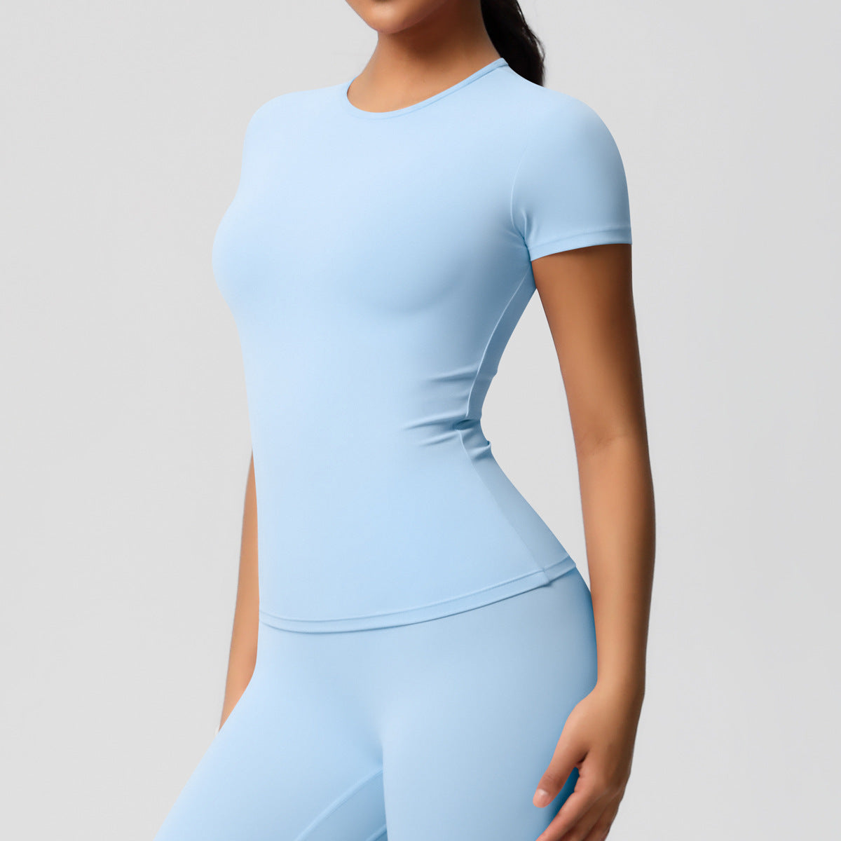 Cross-border European and American yoga pants solid color long-sleeved skin-friendly and breathable back sports short-sleeved slim and thin fitness pants set